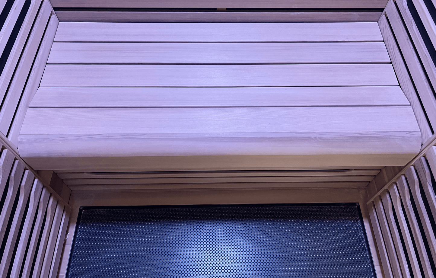 Bench view of Canadian Red Cedar wood in a Nook 2-person sauna
