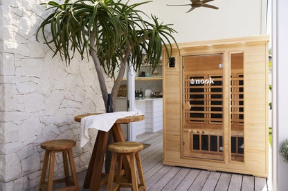 LIfestyle natural shot of the Nook Core 3-person sauna