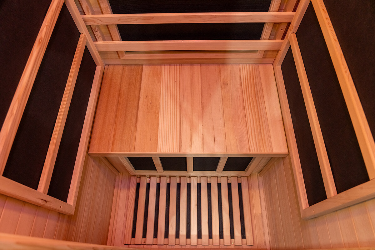 Interior hemlock wall panels inside a Nook Core infrared sauna