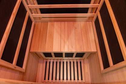 Interior hemlock wall panels inside a Nook Core infrared sauna