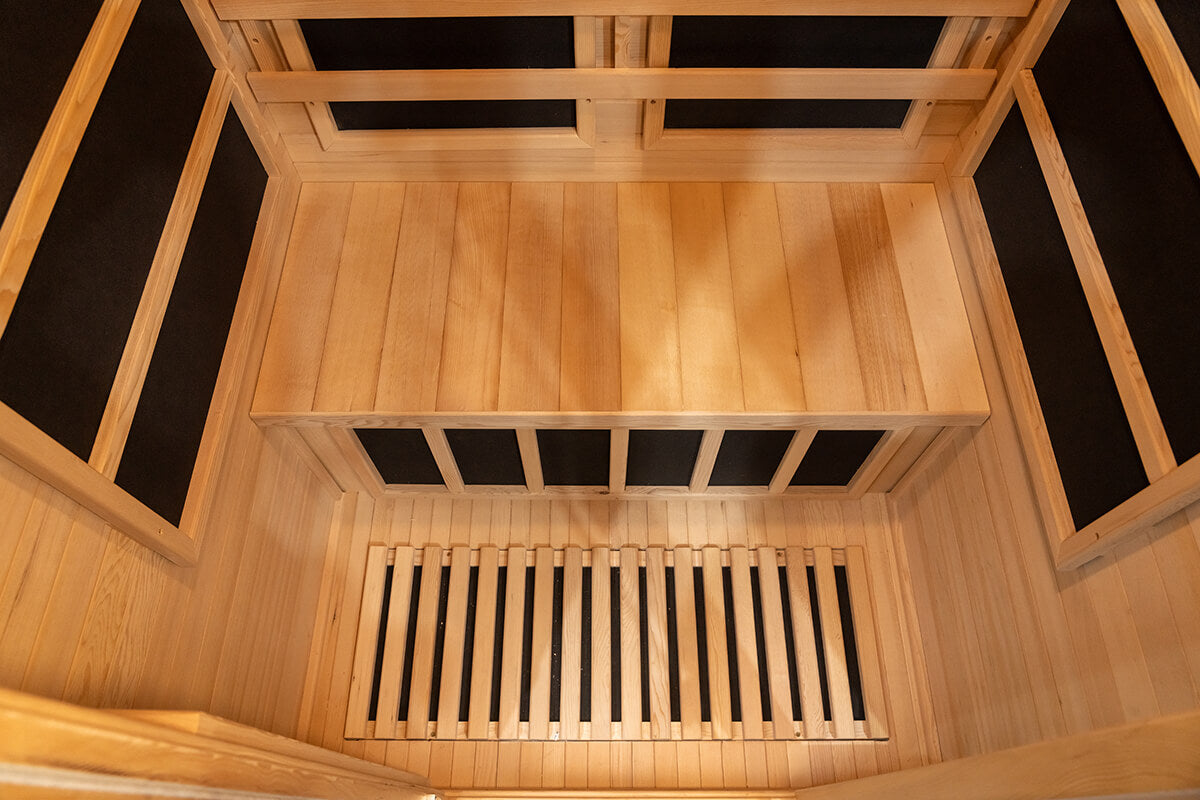 Interior hemlock wall panels inside a Nook Core 2-person infrared sauna