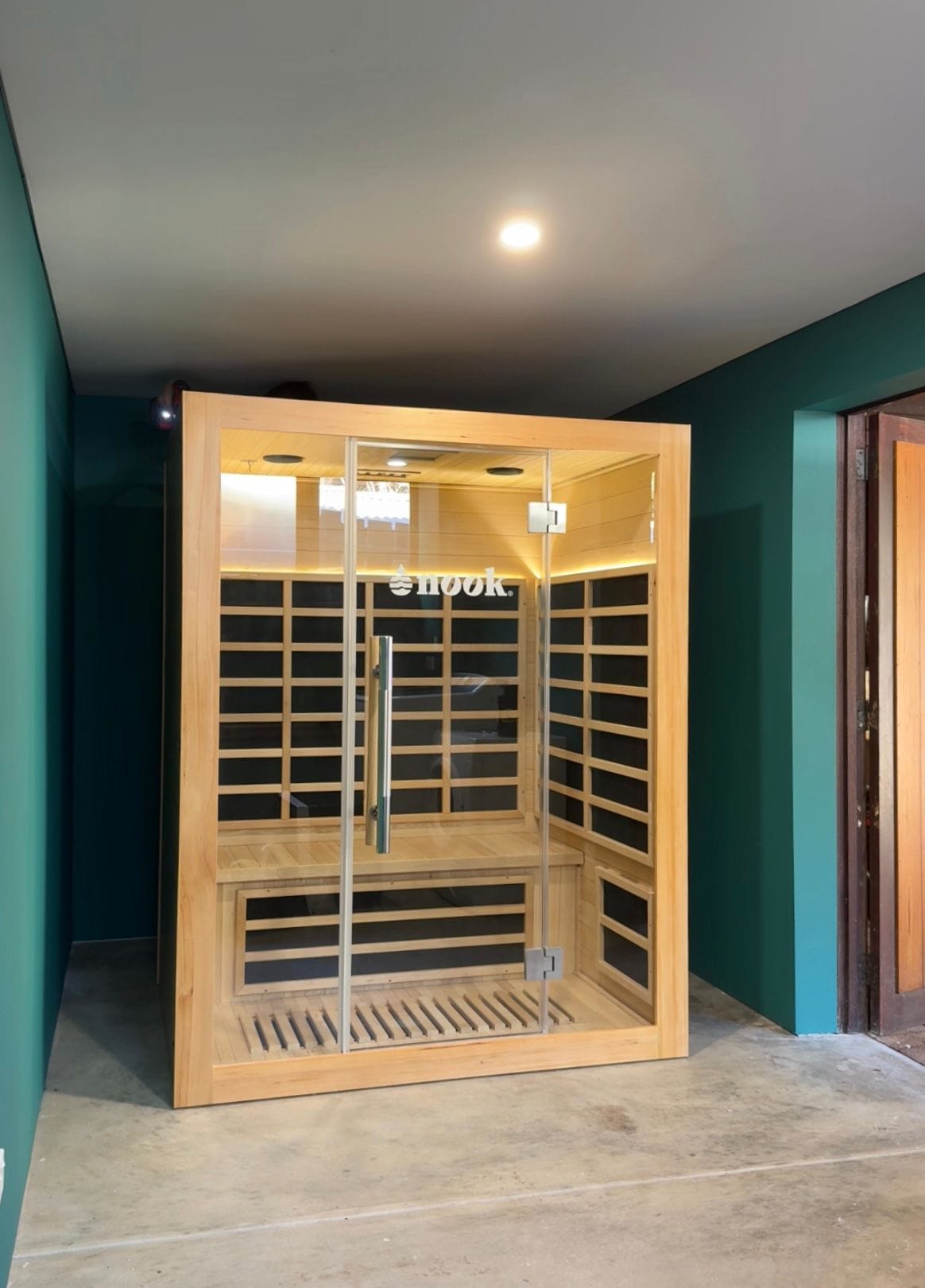 Nook Elite 3-person infrared sauna installed in a room