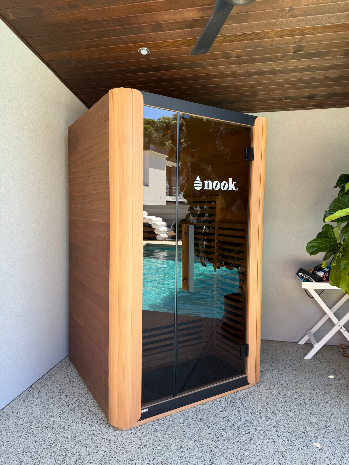 Nook Ultra-2person infrared sauna installed in a home gym setup